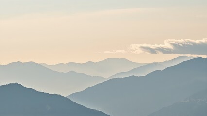 Obraz premium Generative AI, Minimalist Aerial View of Serene Mountain Ranges with Soft Cloud Layers