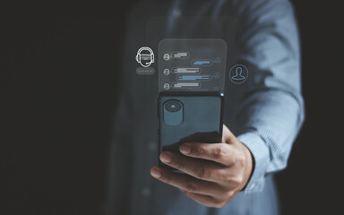 Digital chatbot conversation assistant on smartphone app interface with AI technology providing virtual assistant and customer support. Businessman using mobile phone with chatbot automatic answering.