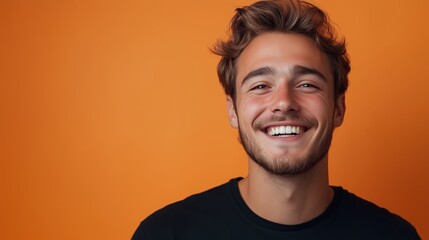 Fototapeta premium Portrait of a happy handsome man in a shirt with laughing
