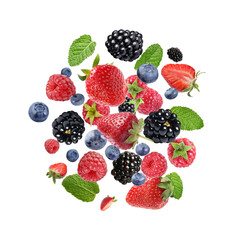 Mix of fresh berries in air on white background