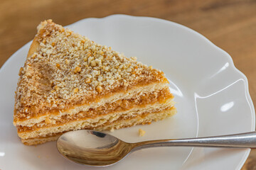 a delicious piece of homemade apple cake on a white plate