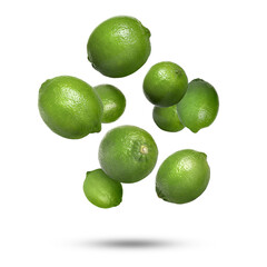 Fresh ripe limes falling on white background
