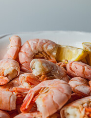Tiger king prawns cooked and seasoned with lemon, close up