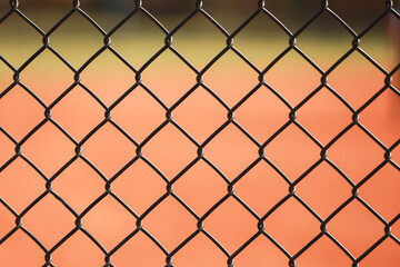 metal baseball softball field fence grid background 