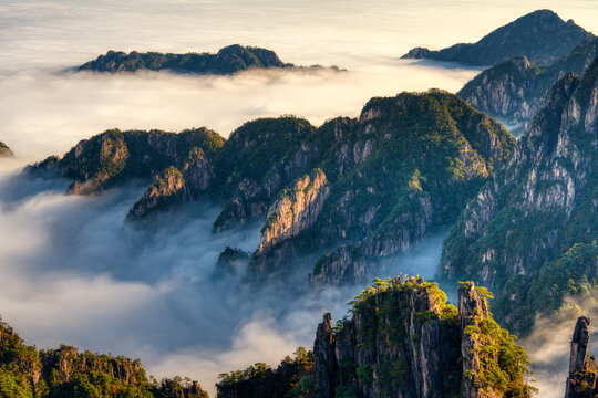 Sea of ​​clouds under the sunset, at Huangshan Mountain.