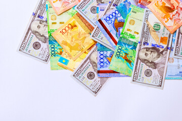 Kazakhstan tenge an American dollar are two denominations of national currency bank notes that are used in international financial transactions