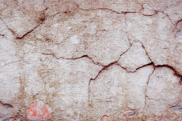 Obraz premium White concrete wall with natural defects. Fragment of the cement surface with natural texture. Monochrome palette of shades.