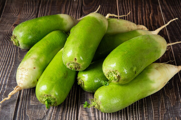 fresh chinese green radish on table.