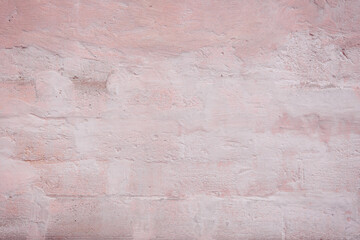 Grunge red concrete background. Textured plaster wall. Color of the year 2025 concept. Top view, layout for design. Surface with peeling shabby pattern.