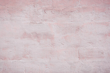 Grunge red concrete background. Textured plaster wall. Color of the year 2025 concept. Top view, layout for design. Surface with peeling shabby pattern.