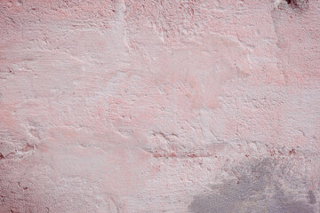 Grunge pink concrete background. Textured plaster wall. Color of the year 2025 concept. Top view, layout for design. Surface with peeling shabby pattern.
