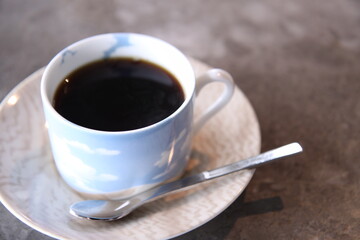 cup of coffee with spoon