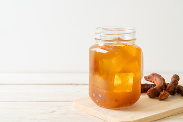 Delicious sweet drink tamarind juice and ice cube