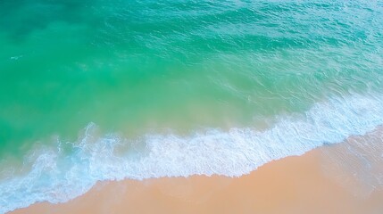 Explore the tranquil beauty of turquoise waves gently caressing golden sands at the beach