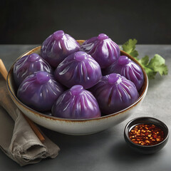 Delicious Purple Dumplings in a Bowl with Spicy Dipping Sauce on a Dark Background