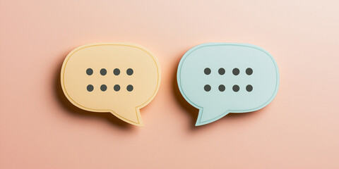 Two pastel-colored speech bubbles with dots on a soft background, representing dialogue and communication