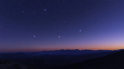 Fototapeta premium A breathtaking view of a starry night sky over a mountain range.