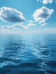 Fototapeta premium Picture of a large body of water with clouds in the sky