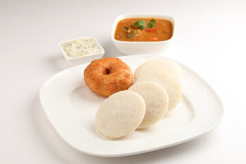 Idli vada with sambar ,sambhar also called medu wada South Indian Breakfast menu, Idly Vadai with coconut chutney and sambar