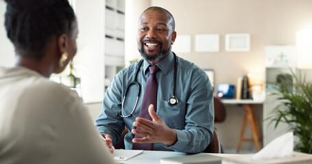 Conversation, healthcare and smile of doctor with patient in office at hospital for consulting or...
