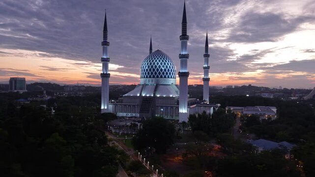 malaysian mosque Masjid Sultan Salahuddin Abdul Aziz Shah during beautiful sunrise aerial shot