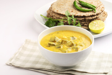 Dahi Bhindi, A preparation of Okra with Curd.It is prepared in several district of India.It has Tangy flavour.served with roti Indian flat bread ,rice