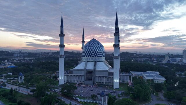 malaysian mosque Masjid Sultan Salahuddin Abdul Aziz Shah during beautiful sunrise aerial shot