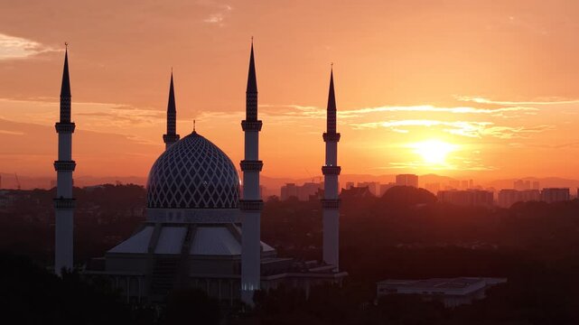 malaysian mosque Masjid Sultan Salahuddin Abdul Aziz Shah during beautiful sunrise aerial shot