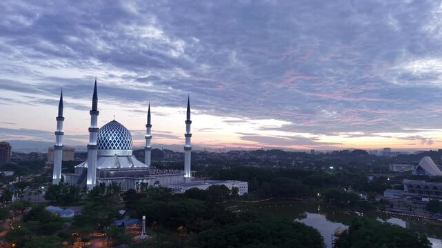 malaysian mosque Masjid Sultan Salahuddin Abdul Aziz Shah during beautiful sunrise aerial shot