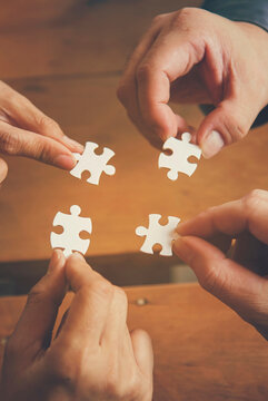 Vertical Horizon Implement puzzle improve solve synergy organize team building connection plan trust service strategy. Vertical Stakeholders business trust teams hands holding jigsaw puzzle synergy