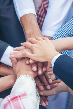 Vertical Partners hands together teamwork group of business people meeting in firm company office. Vertical Horizon of Diversity Hands join empower partnership teams connection Mergers acquisitions