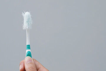 A damaged toothbrush is a breeding ground for germs and bacteria, which can cause swollen gums.