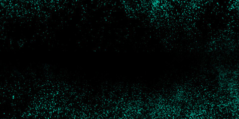 Abstract small shiny particles with different scale covered dark background. Colourful glowing Christmas garland with blur background and bokeh