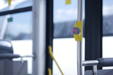 Closeup of Bus bell switch for stop inside the public bus