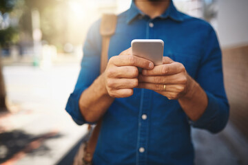 City, person and hands with smartphone for connection, networking and chat with online contact. Outdoor, businessman and mobile app by closeup for social media text, communication and travel by flare
