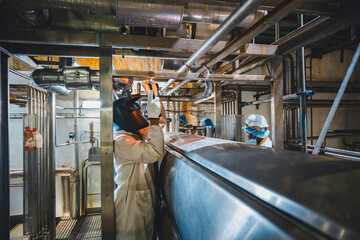 Welding arc argon worker male repaired metal is welding sparks industrial construction repair pipe