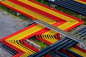 Pipe line oil and gas yellow and red valves at gas plant pressure safety valve