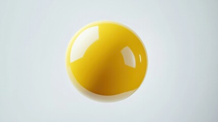 Glossy yellow rubber ball in the air, isolated on a white background