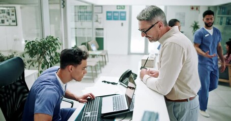Hospital, nurse on computer and man in lobby for appointment, consultation and medical service. Healthcare, clinic and mature patient at administration desk for help, check in and collect medicine