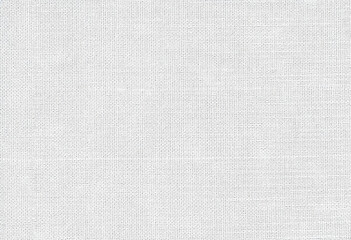 Fototapeta premium close up view of textured white fabric, showcasing its intricate weave and soft appearance, perfect for various design projects