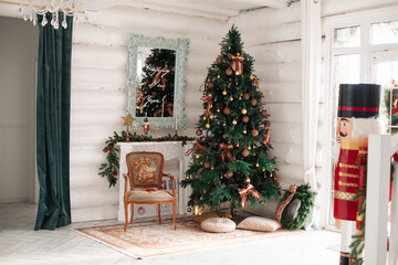 Fototapeta premium Stylish Christmas tree, New Year's interior, beautiful decor in the house