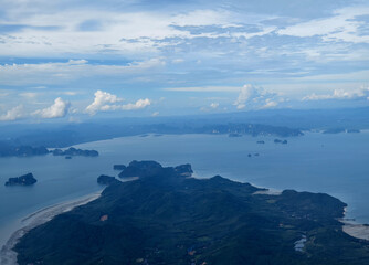 A breathtaking view of the vast ocean as seen from an airplane window