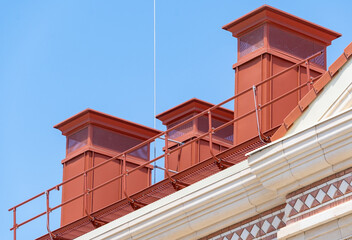 house with a roof from a red shingles with a pipe