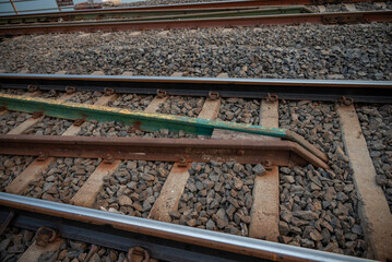 Naklejka premium Railway track in India. Indian Railways Diesel-Electric Multiple Unit train