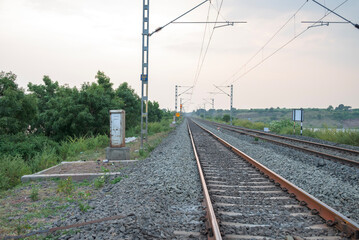 Railway track in India. Indian Railways Diesel-Electric Multiple Unit train