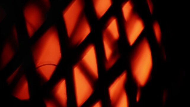 abtrack video of diamond pattern rotating yellow light background