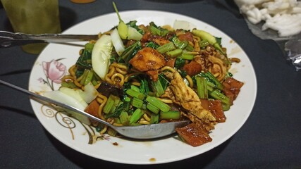 fried noodles in indonesian street food