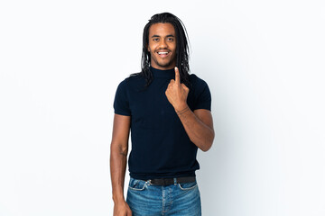 Delivery African American man with braids isolated on white background with surprise facial...