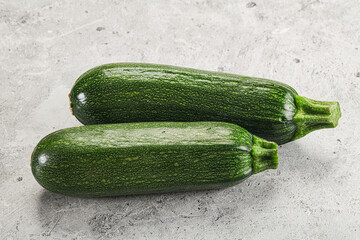 Raw green ripe zucchini vegetable