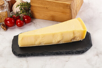 Hard parmesan cheese piece triangle